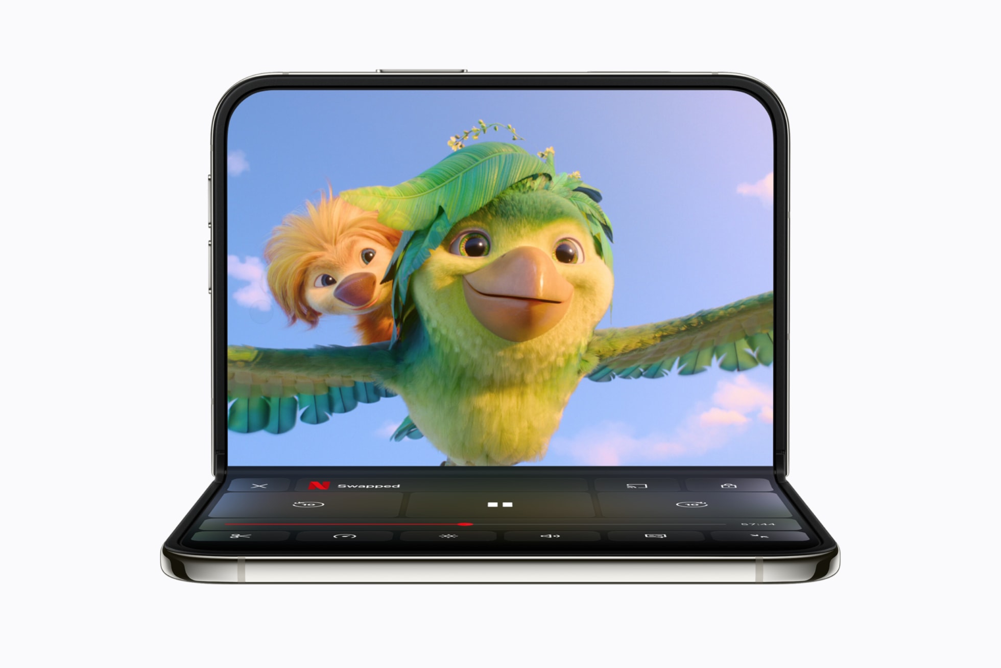 iPhone Duo partly folded like a small laptop, playing an animated movie in Netflix on the upper half with playback controls on the lower half