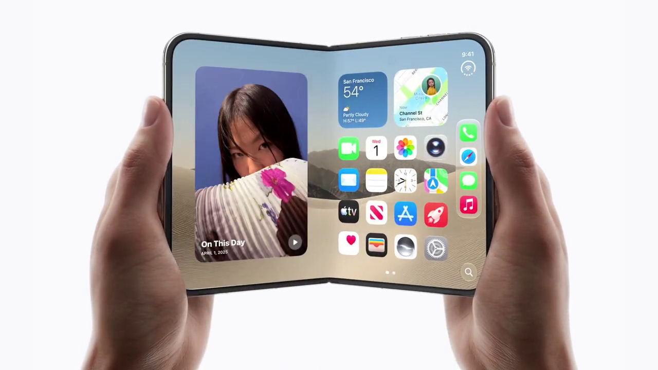 Two hands holding the iPhone Duo open, its inner display showing an On This Day photo and the home screen